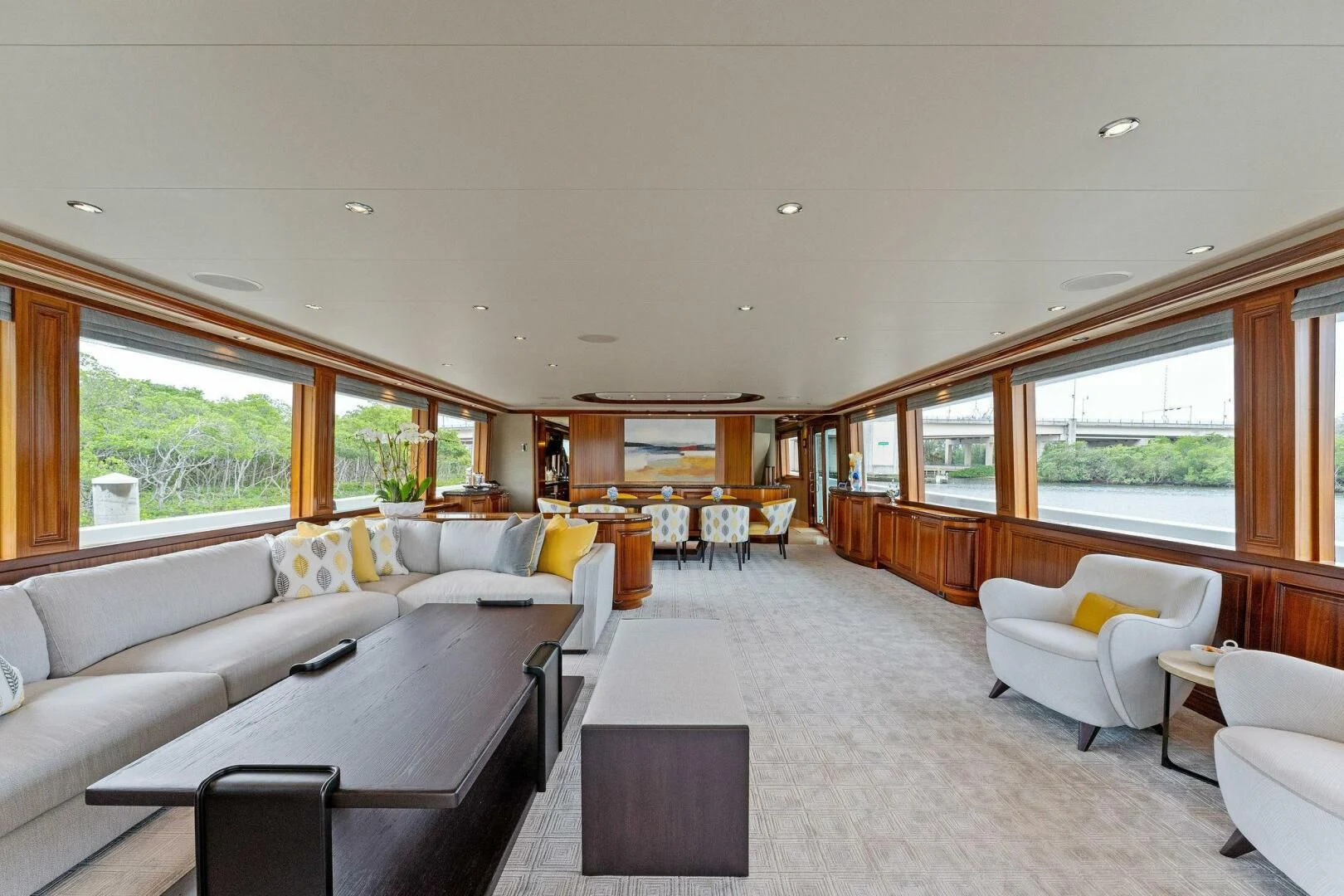 a living room with a couch and a table aboard ANTARES Yacht for Sale