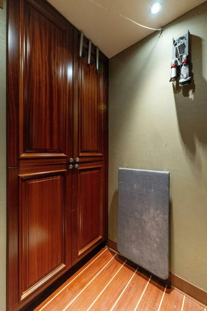 a wood cabinet in a room aboard ANTARES Yacht for Sale