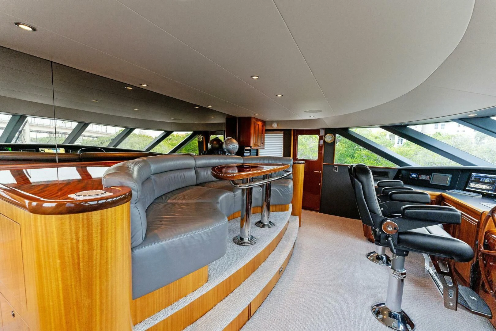 a room with a couch and a table and chairs aboard ANTARES Yacht for Sale