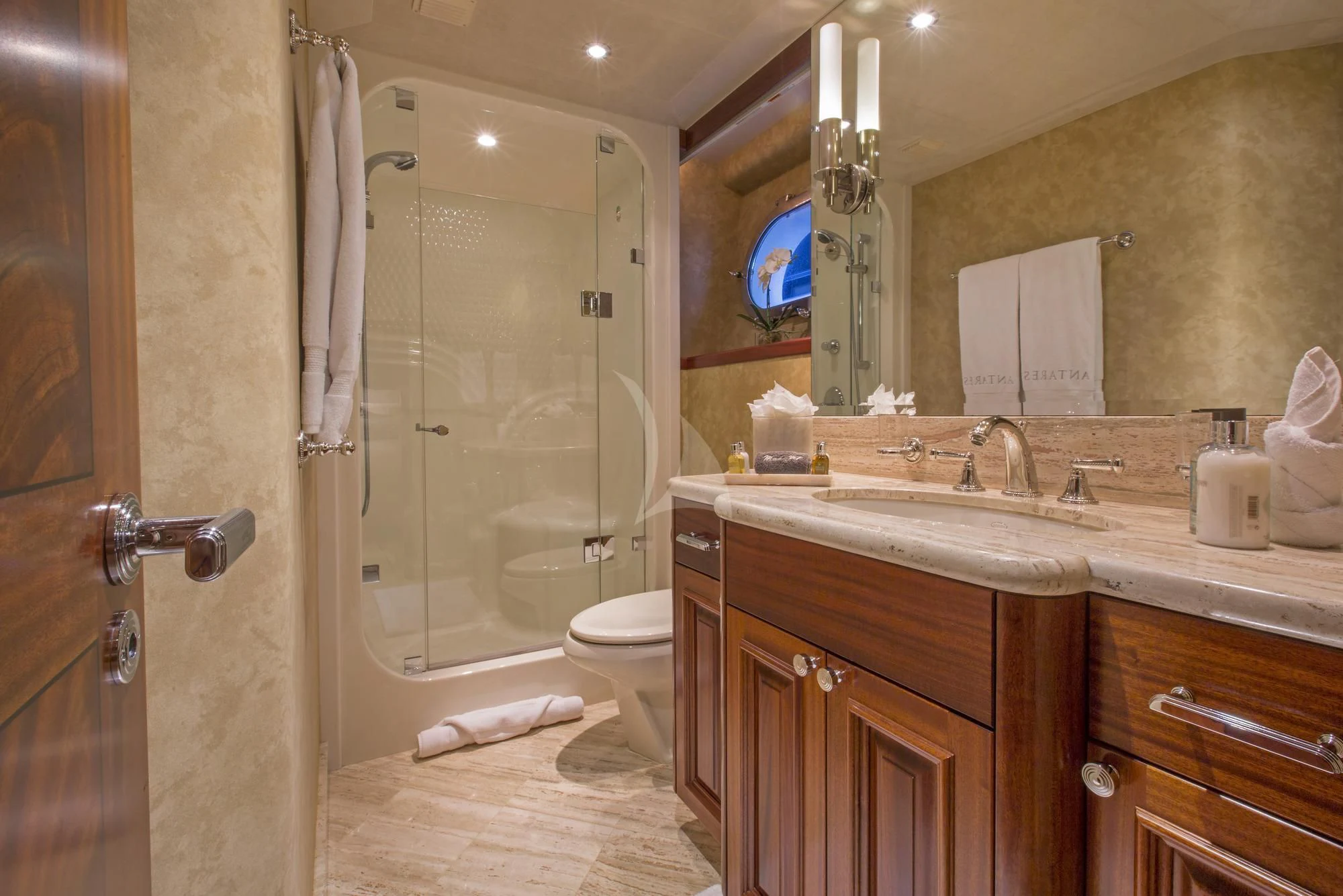 a bathroom with a shower and sink aboard ANTARES Yacht for Sale