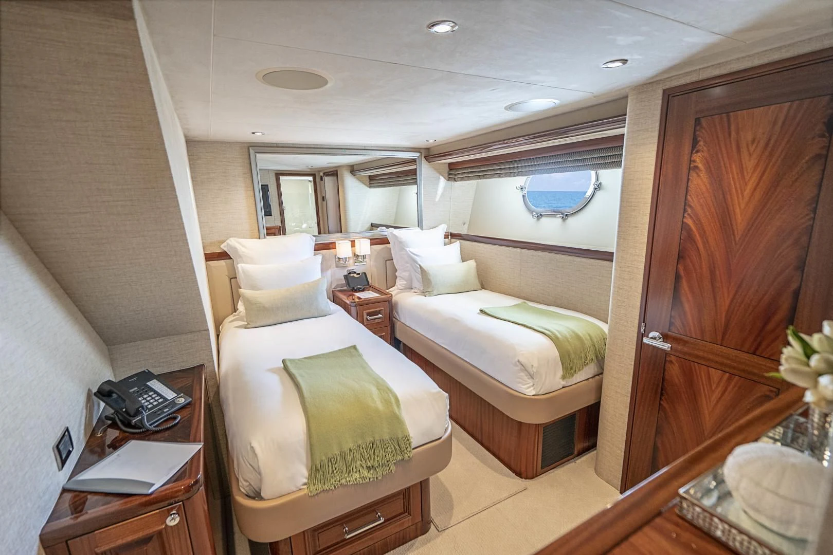 a room with two beds aboard ANTARES Yacht for Sale
