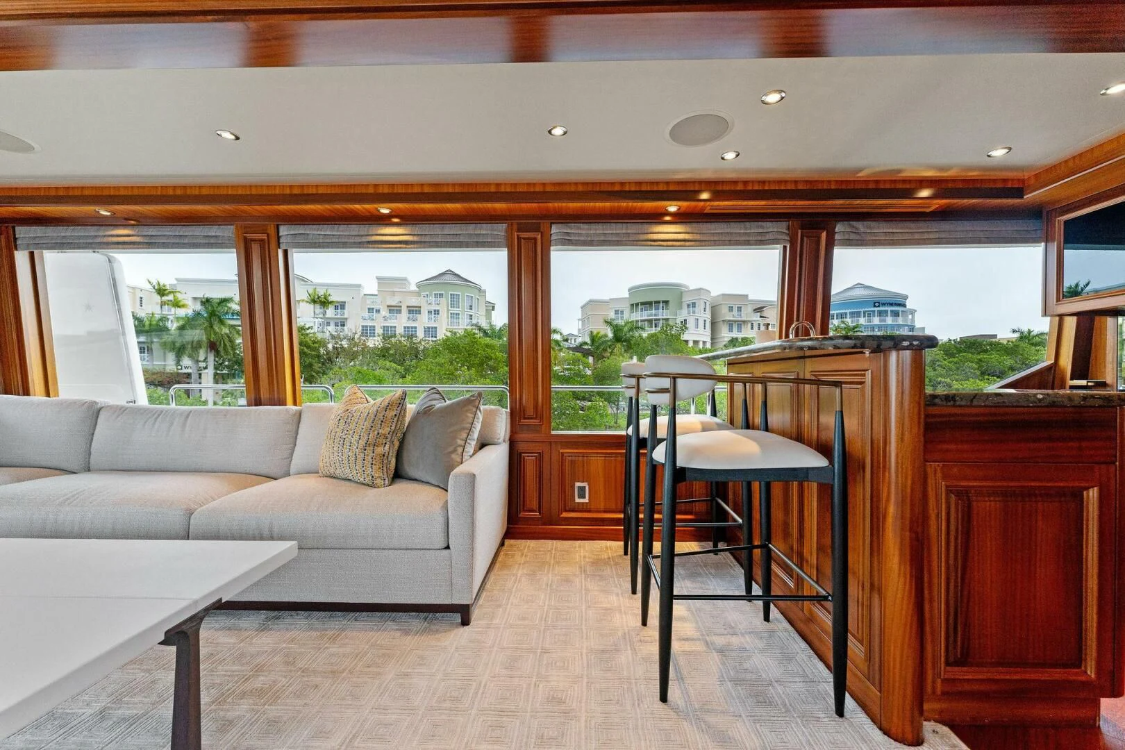 a living room with a couch and a table aboard ANTARES Yacht for Sale
