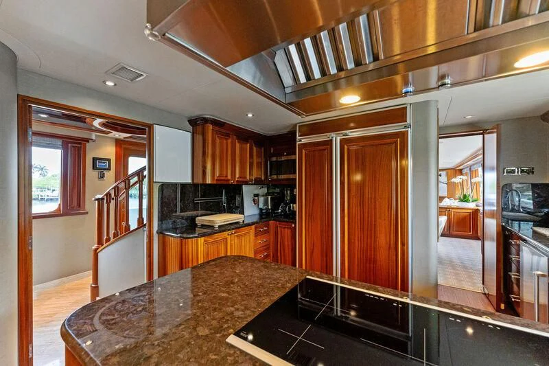 a kitchen with a marble counter top aboard ANTARES Yacht for Sale