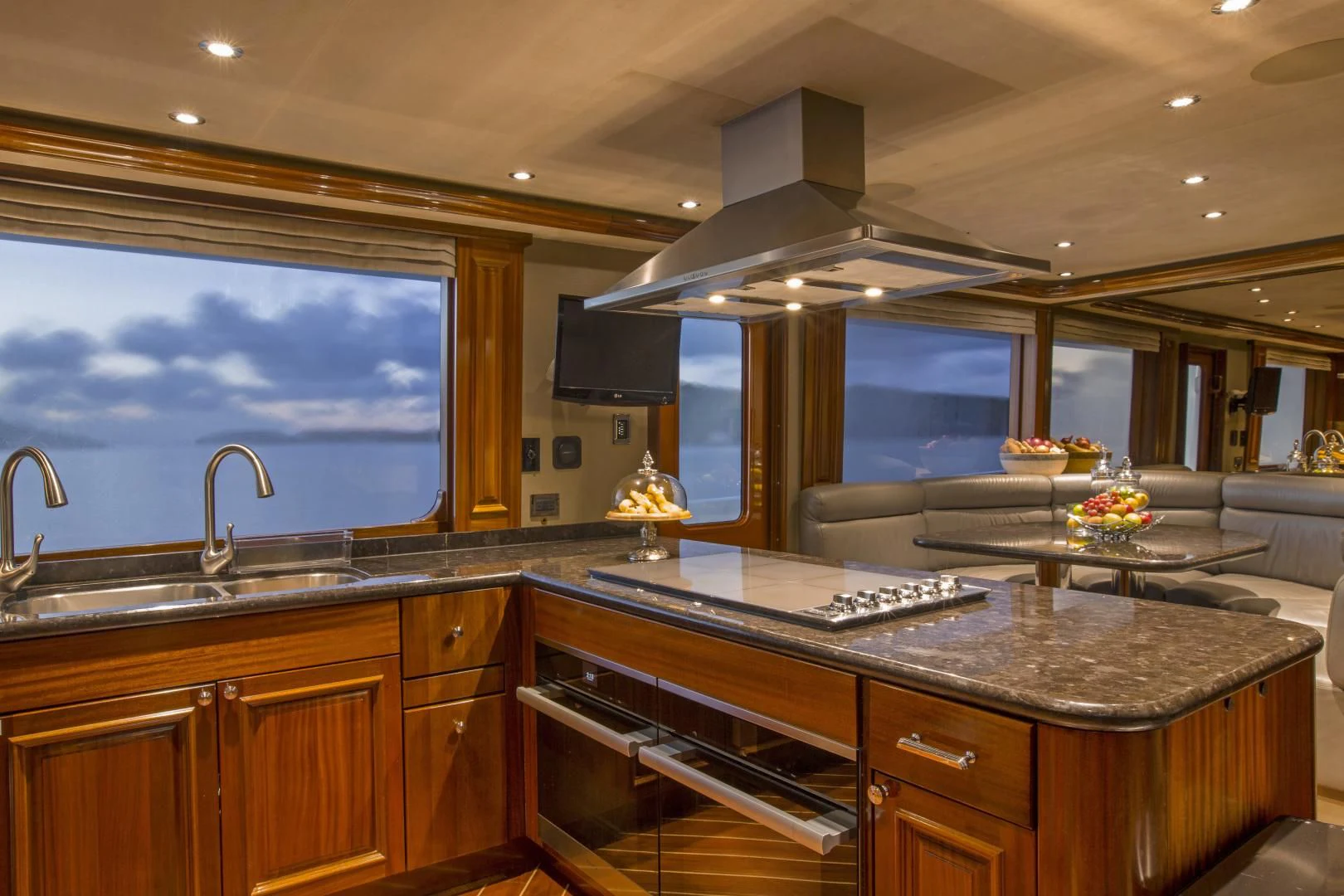 a kitchen with a large island aboard ANTARES Yacht for Sale