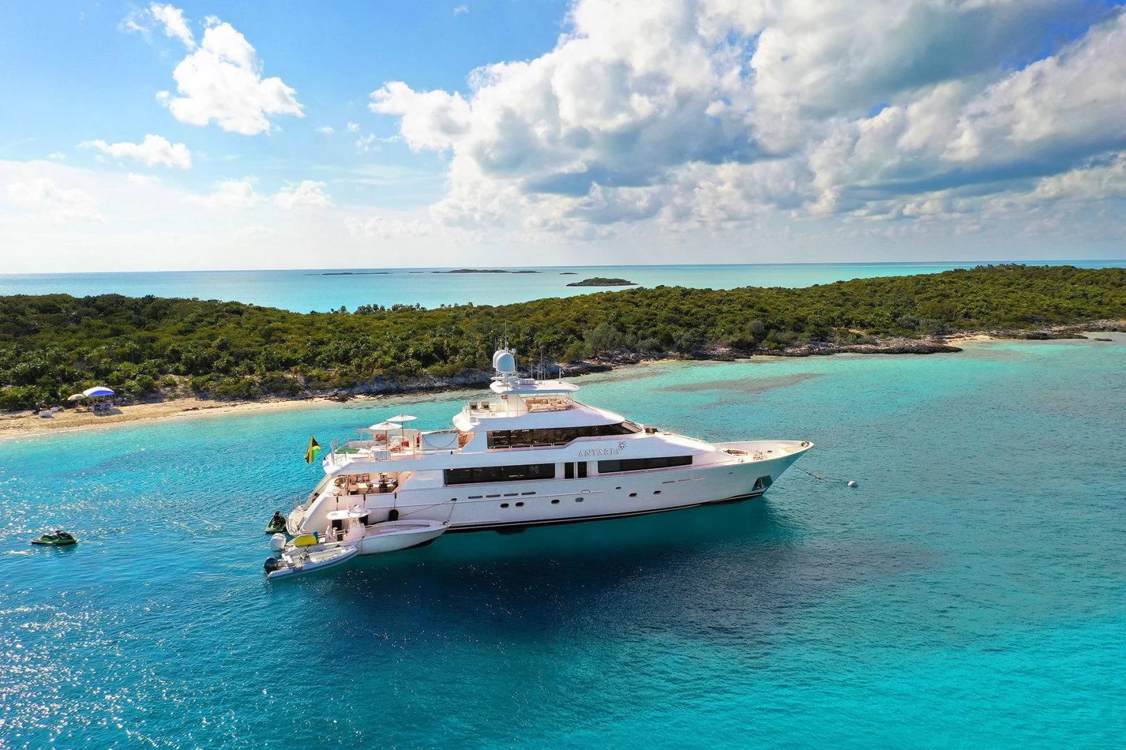 a white boat on water aboard ANTARES Yacht for Sale