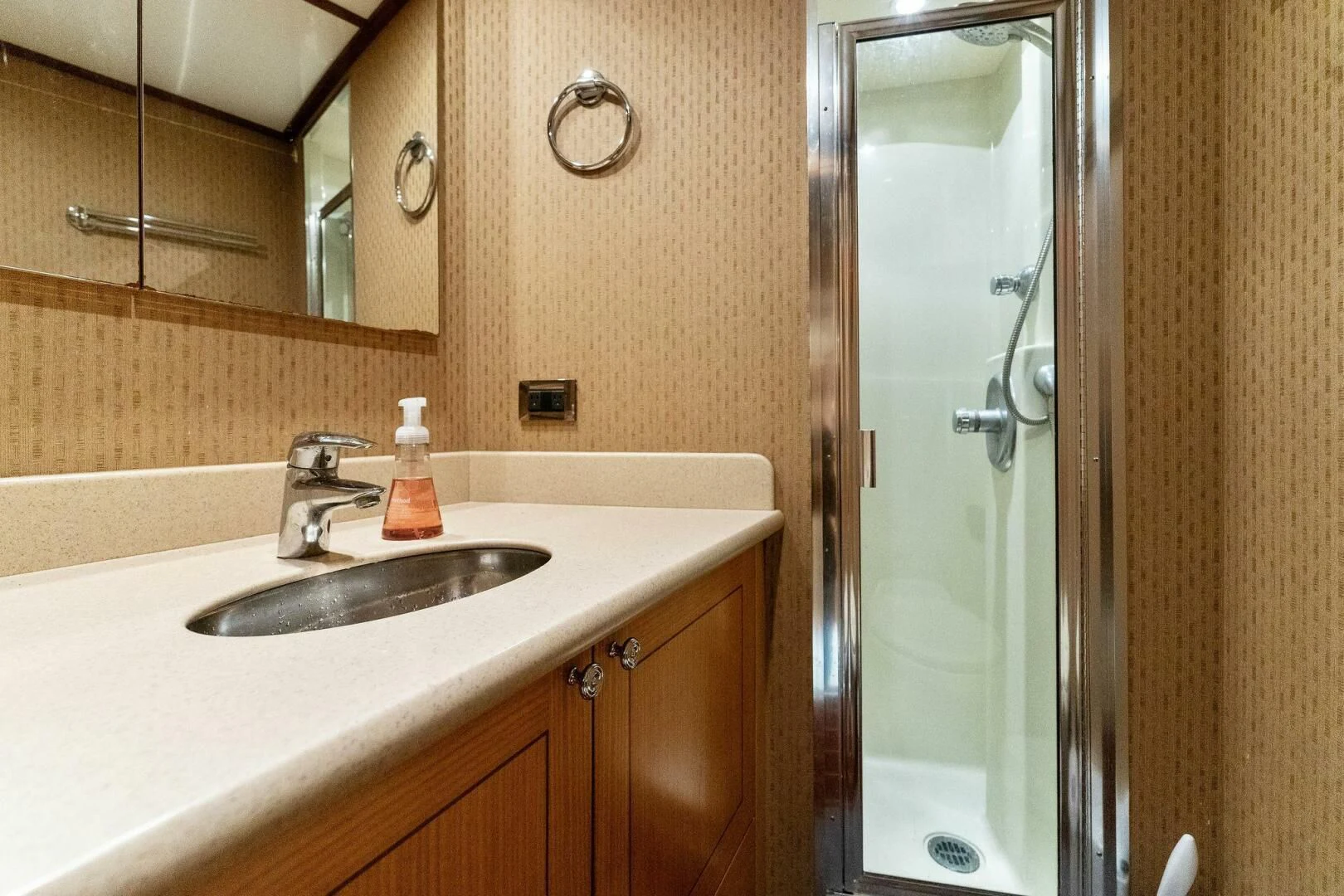 a bathroom with a sink and a shower aboard ANTARES Yacht for Sale