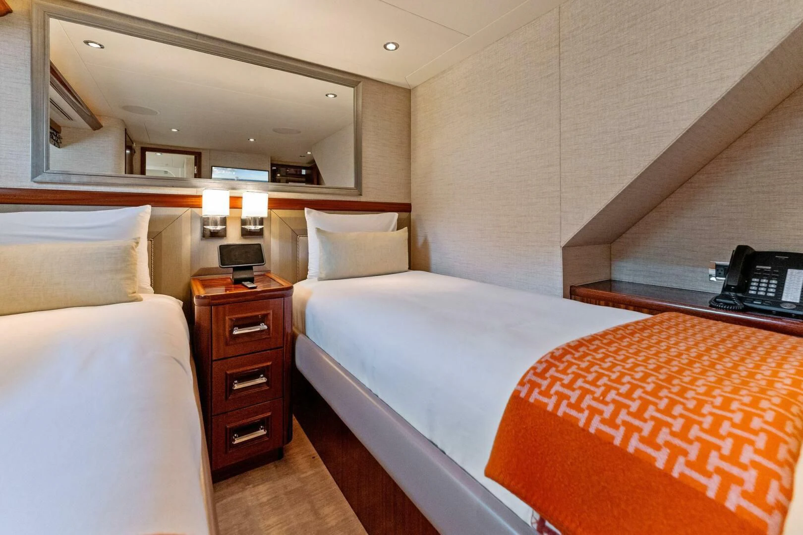 a room with two beds aboard ANTARES Yacht for Sale