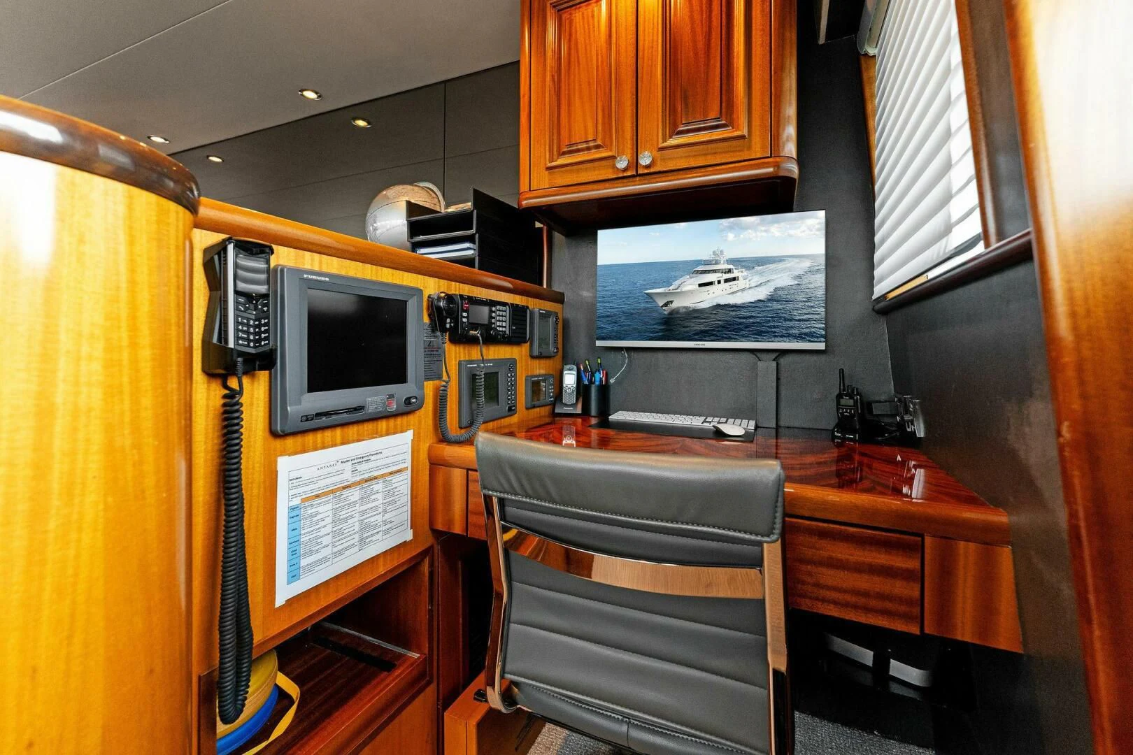 a kitchen with a microwave oven and a table aboard ANTARES Yacht for Sale
