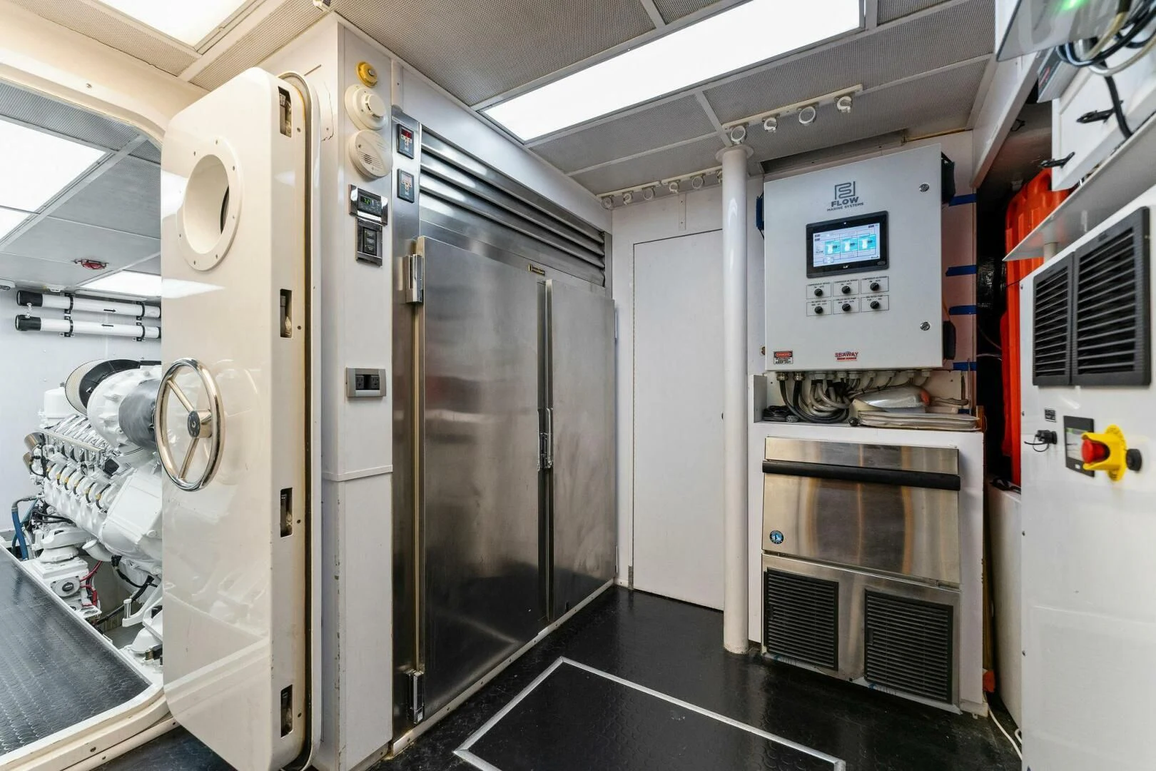 a large room with a large refrigerator aboard ANTARES Yacht for Sale