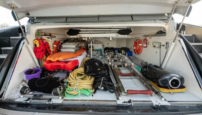 a room with clothes and other items aboard EL DISPARO Yacht for Sale