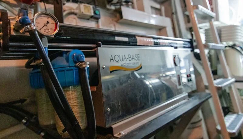 a machine with a large piece of equipment in it aboard EL DISPARO Yacht for Sale
