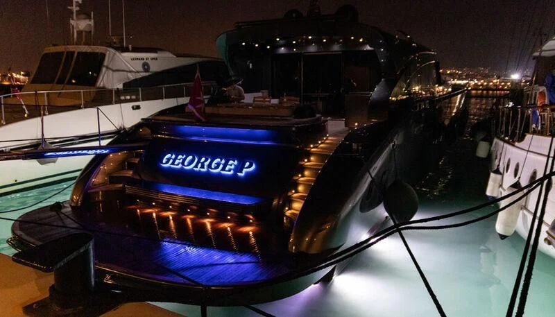 a car on display aboard EL DISPARO Yacht for Sale