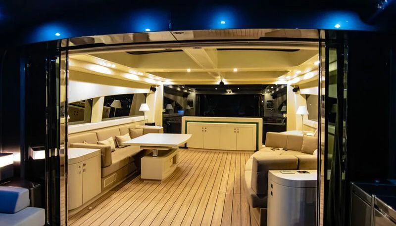 a room with a couch and a table aboard EL DISPARO Yacht for Sale