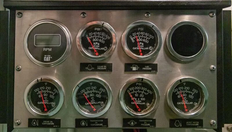 a close-up of a car dashboard aboard EL DISPARO Yacht for Sale