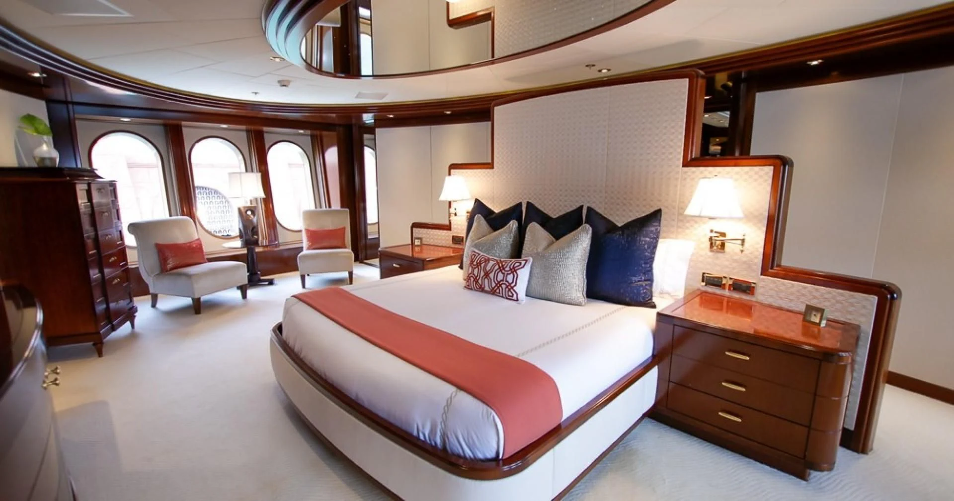 a large bed in a room aboard BLUE MOON Yacht for Charter