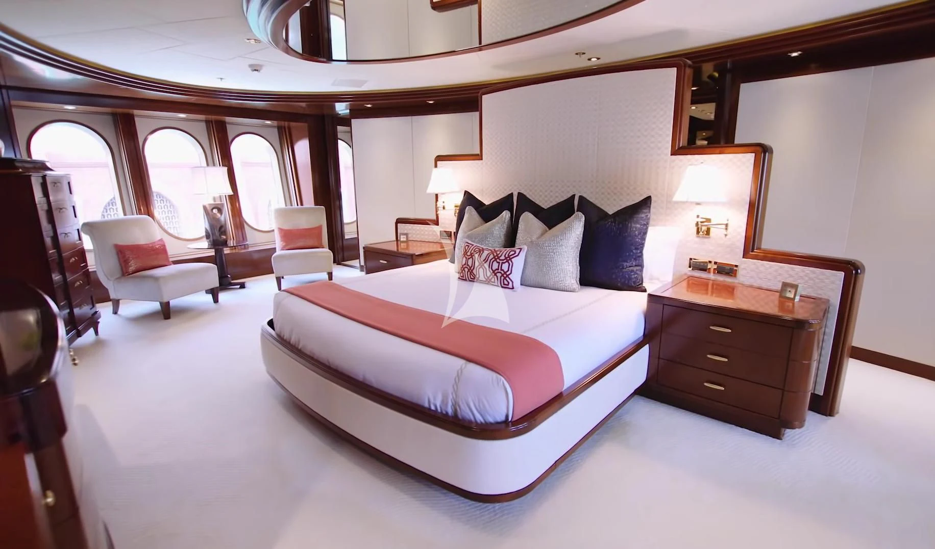 a large bed in a room aboard BLUE MOON Yacht for Charter