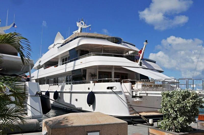 a white yacht docked aboard BLUE MOON Yacht for Charter