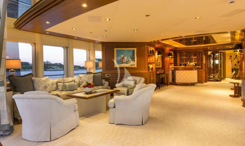 a living room with a large window aboard BLUE MOON Yacht for Charter