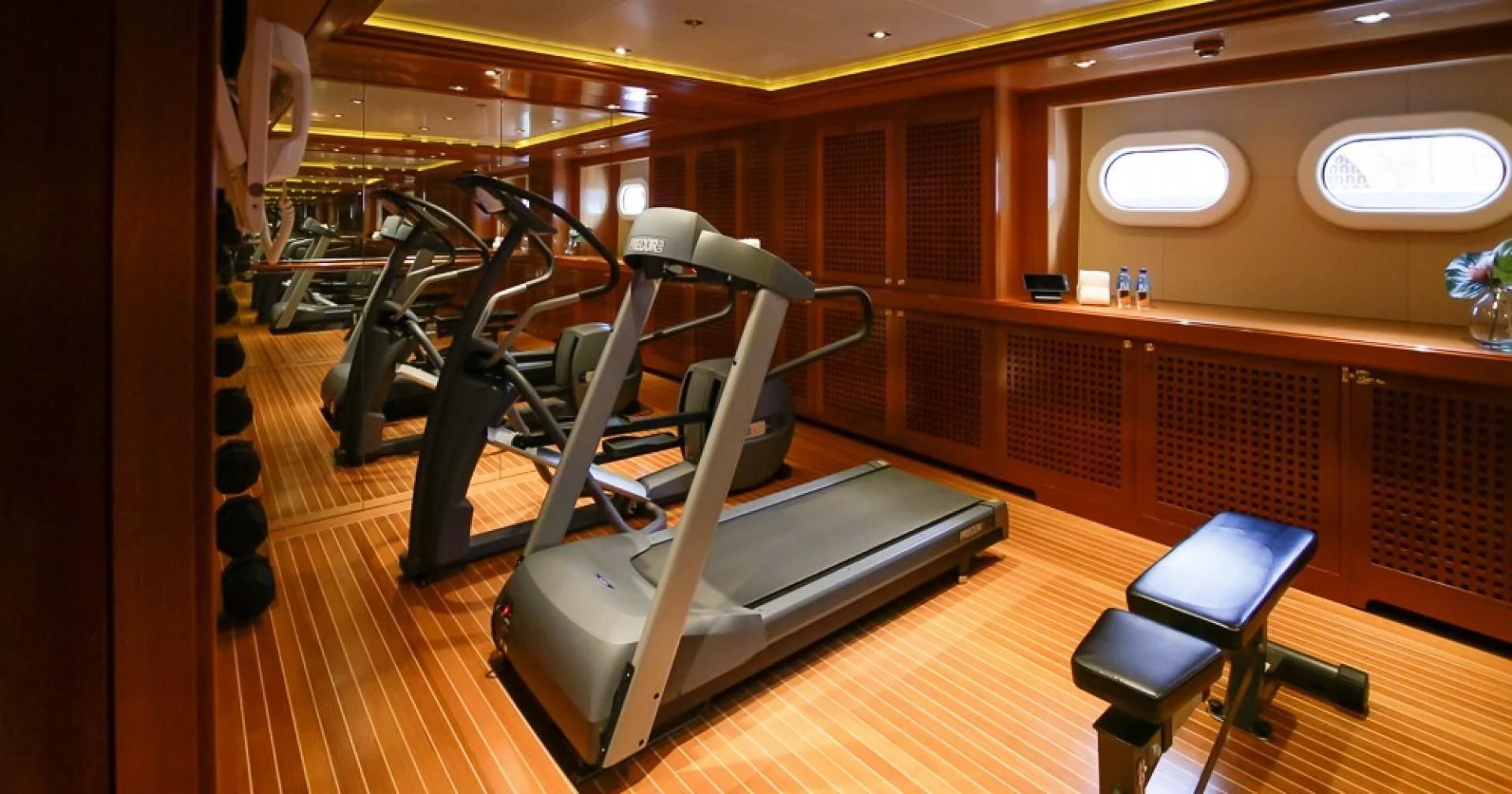gym with exercise equipment aboard BLUE MOON Yacht for Charter