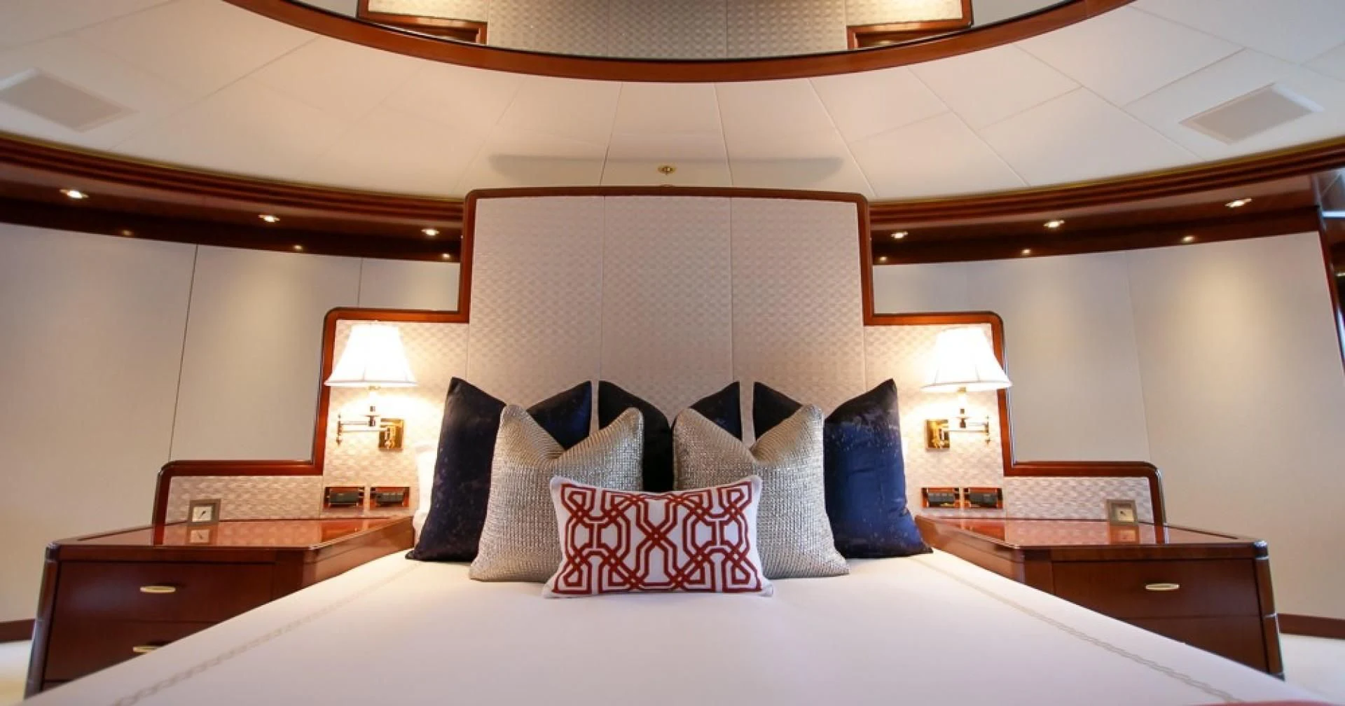 a bed with pillows and pillows aboard BLUE MOON Yacht for Charter