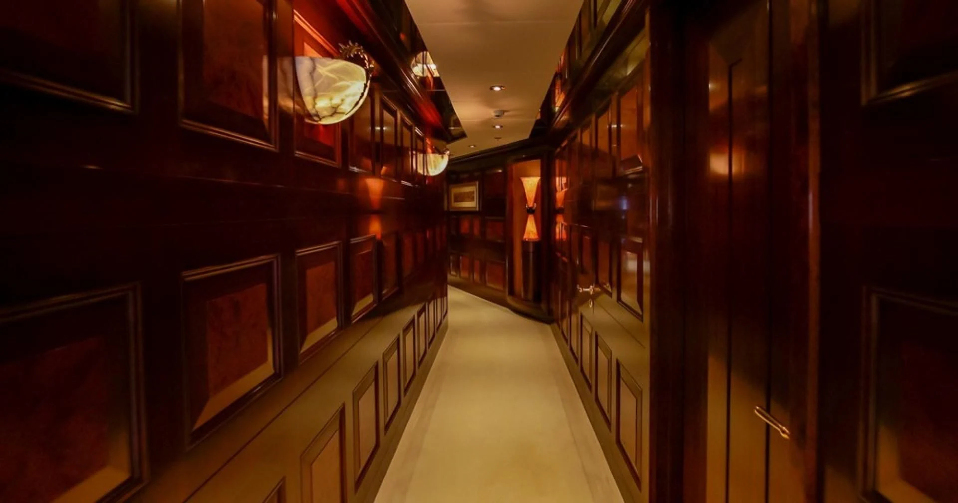 a train station with a large mirror aboard BLUE MOON Yacht for Charter