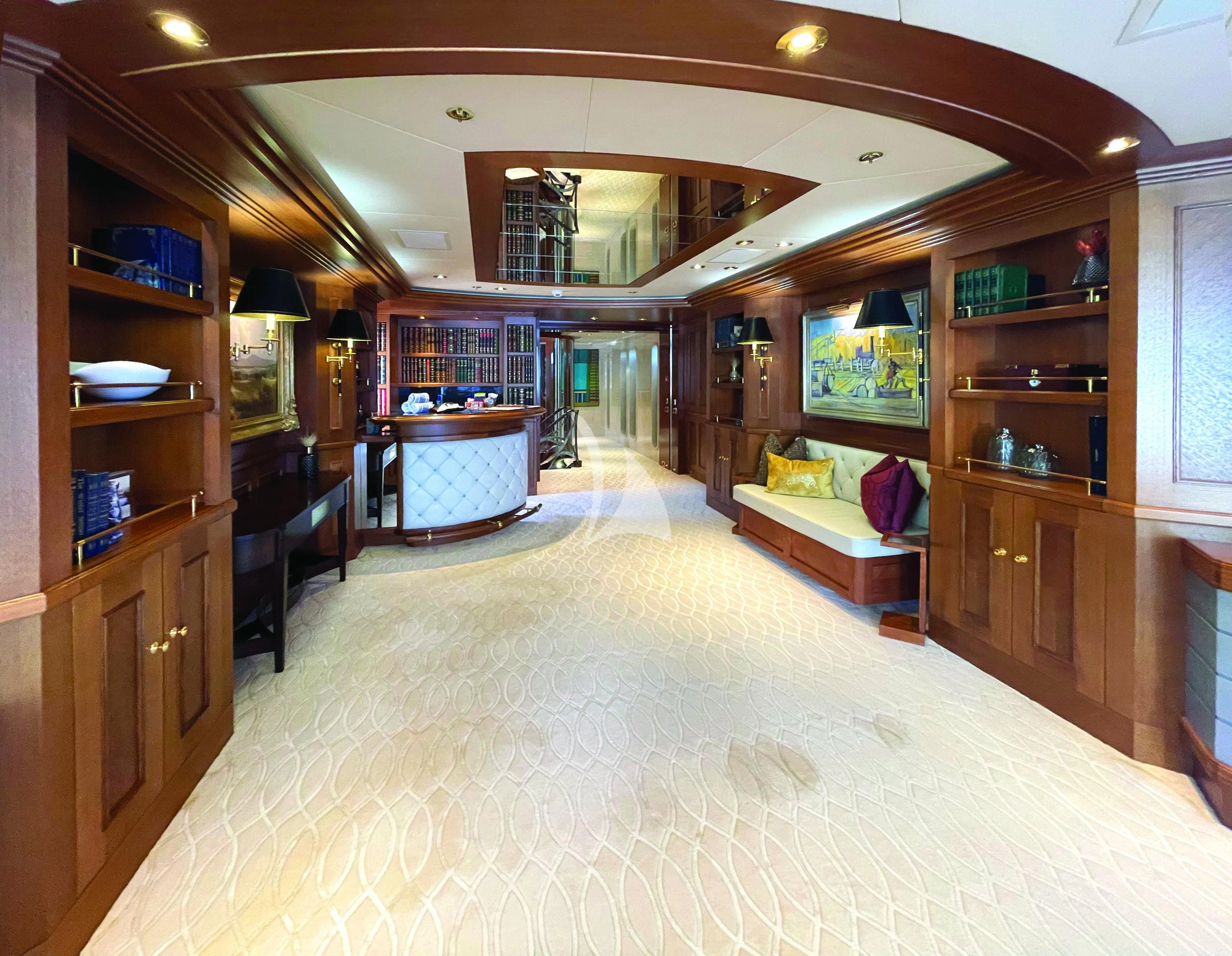a room with a large mirror and shelves aboard BLUE MOON Yacht for Charter