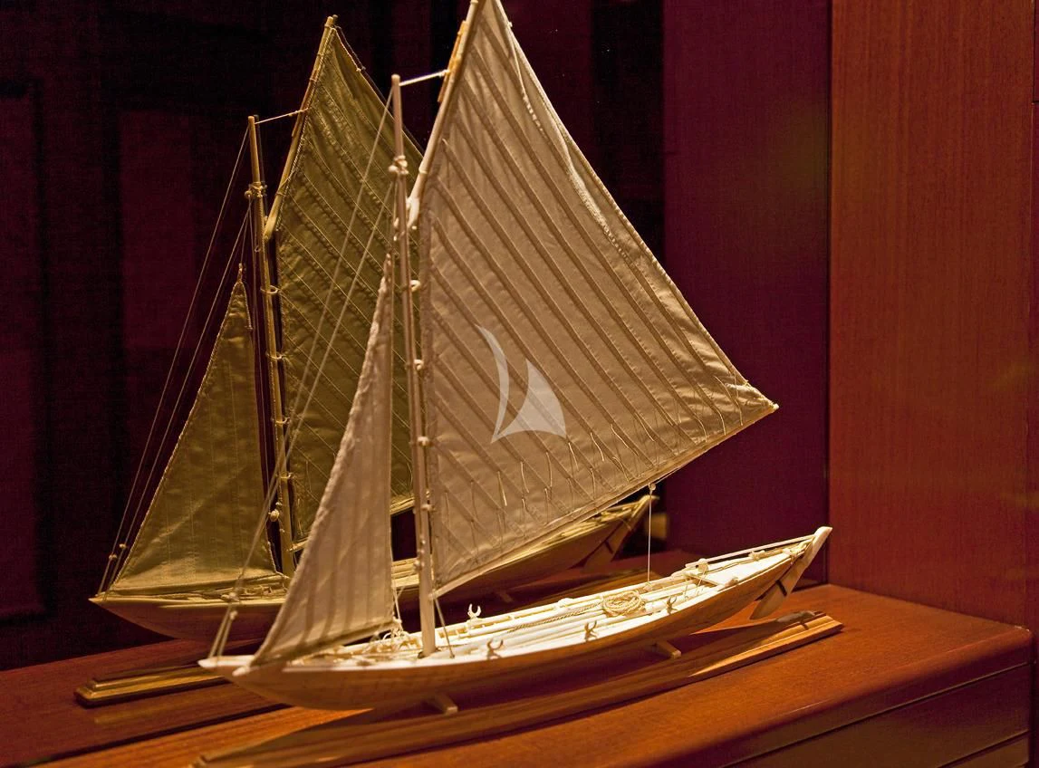 a model of a boat aboard BLUE MOON Yacht for Charter