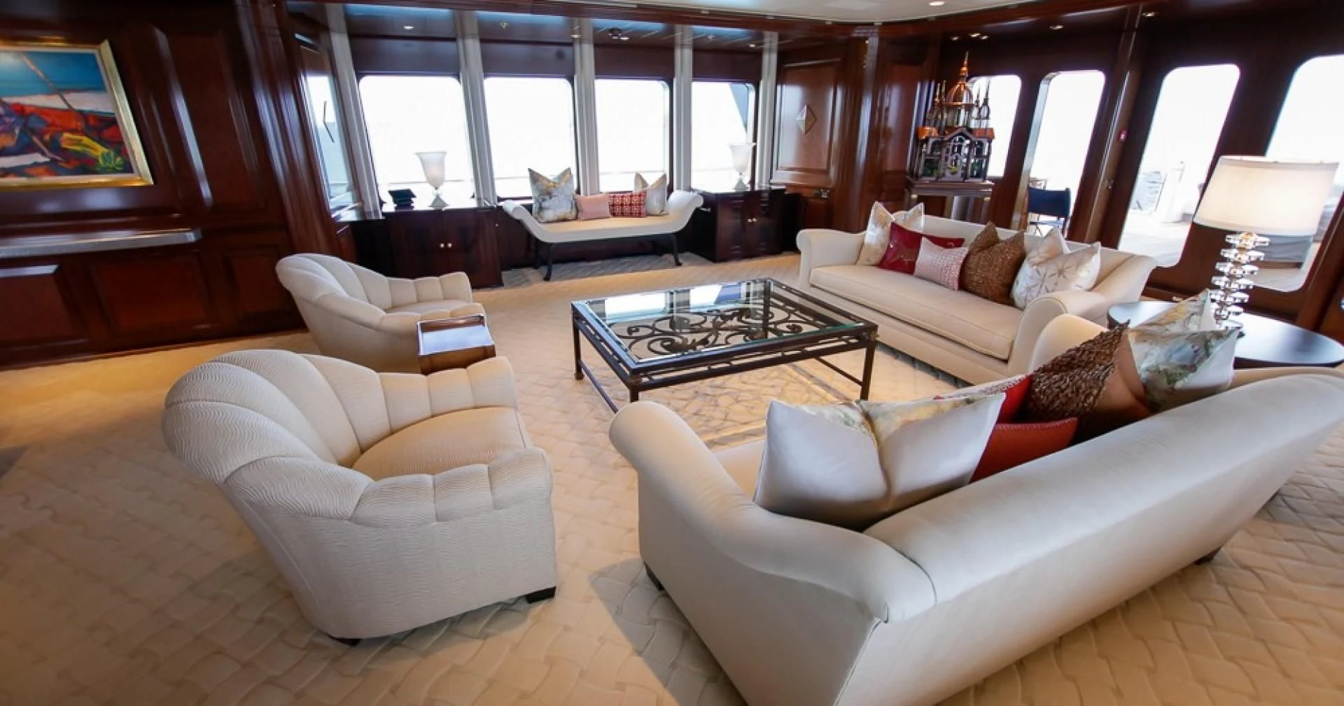 a living room with a couch and a coffee table aboard BLUE MOON Yacht for Charter