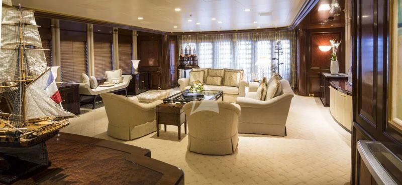 a living room with a large window aboard BLUE MOON Yacht for Charter