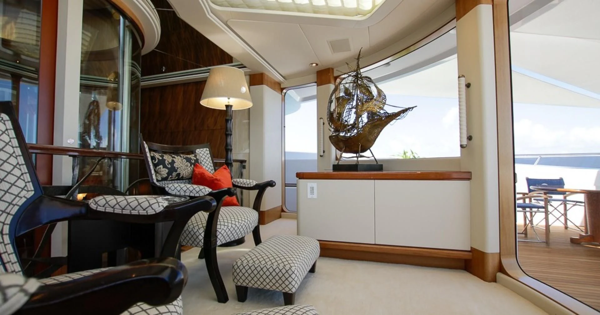 a room with a couch and a table and chairs aboard BLUE MOON Yacht for Charter