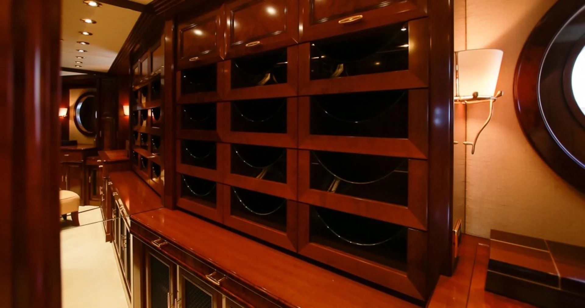 a large wooden cabinet aboard BLUE MOON Yacht for Charter