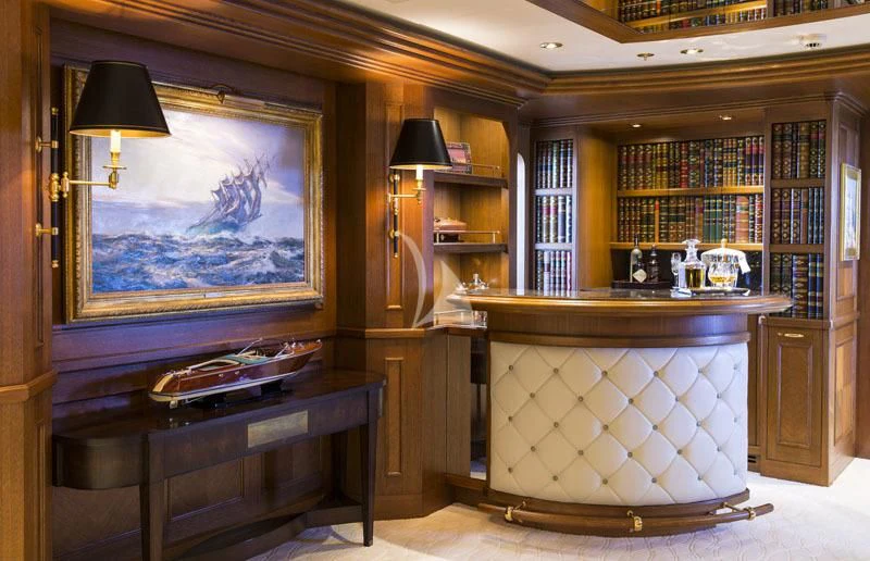 a large fireplace in a room aboard BLUE MOON Yacht for Charter