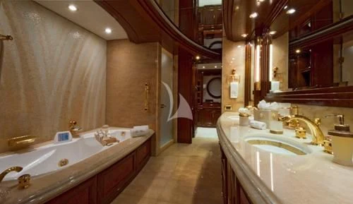 a bathroom with a large tub aboard BLUE MOON Yacht for Charter