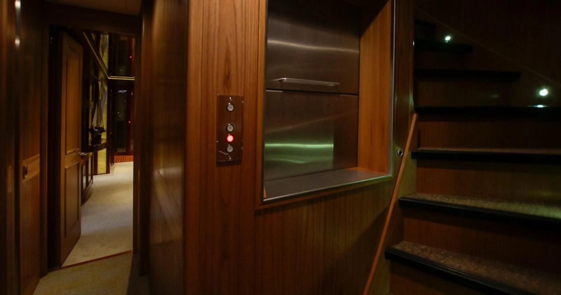 a door with a light on it aboard BLUE MOON Yacht for Charter