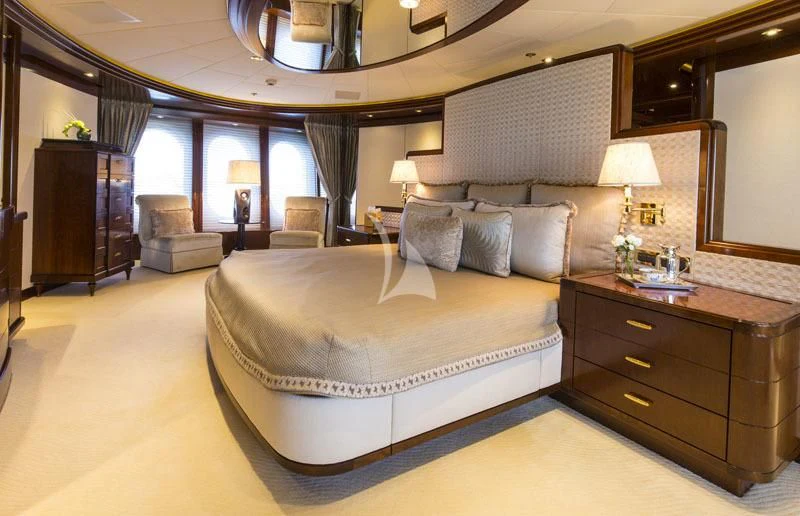 a large bedroom with a large bed aboard BLUE MOON Yacht for Charter