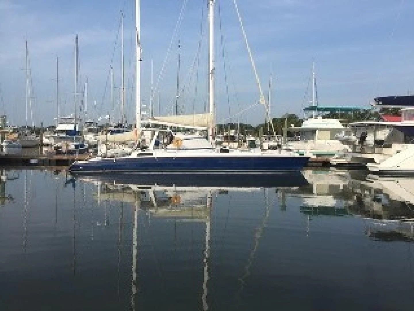 a marina with boats aboard BLUE MOON Yacht for Charter