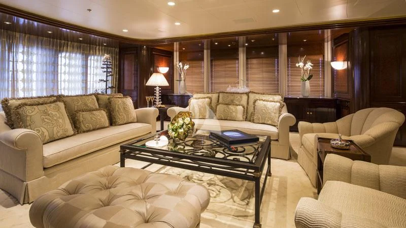 a living room with a large window aboard BLUE MOON Yacht for Charter