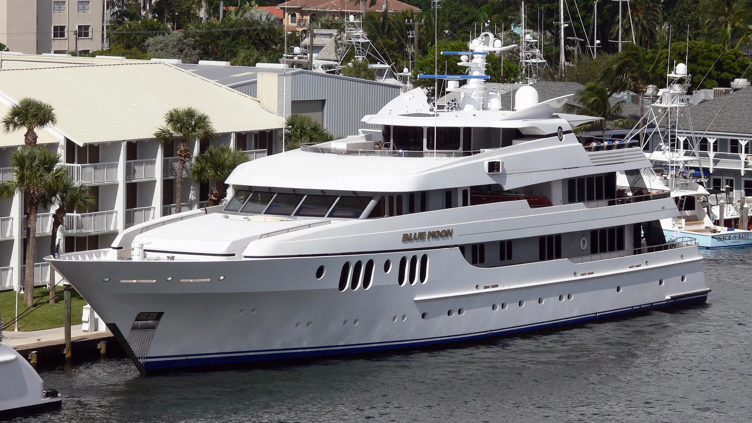 a large white yacht aboard BLUE MOON Yacht for Charter