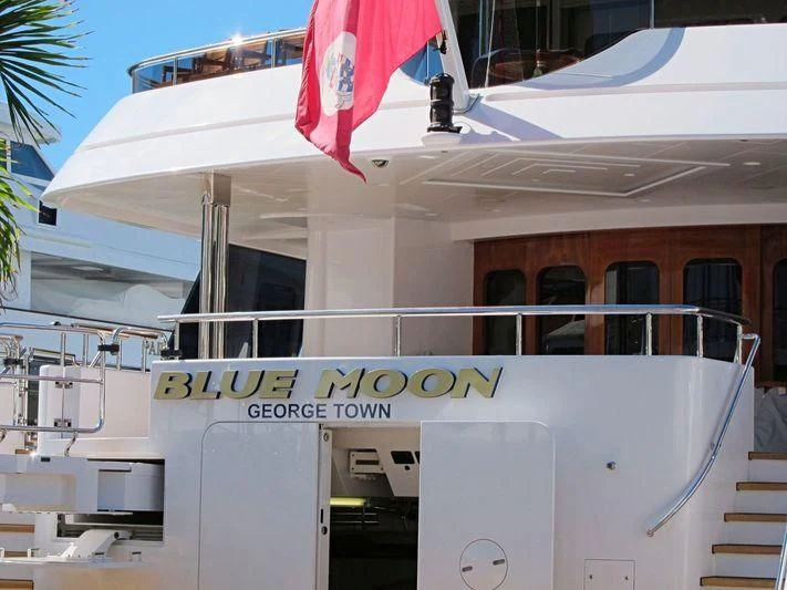 a building with a flag on the roof aboard BLUE MOON Yacht for Charter