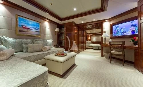 a large bedroom with a large bed aboard BLUE MOON Yacht for Charter