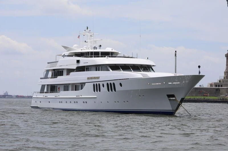 a large white yacht aboard BLUE MOON Yacht for Charter
