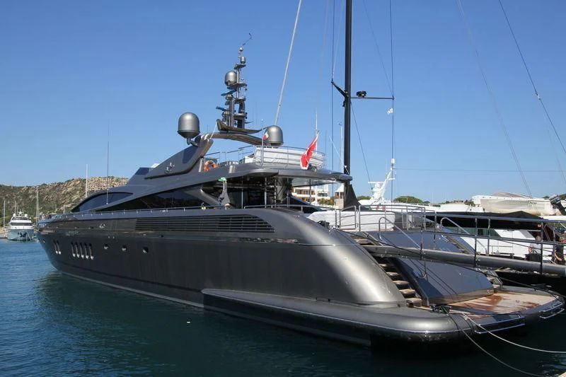 a large black boat aboard TENSHI Yacht for Sale