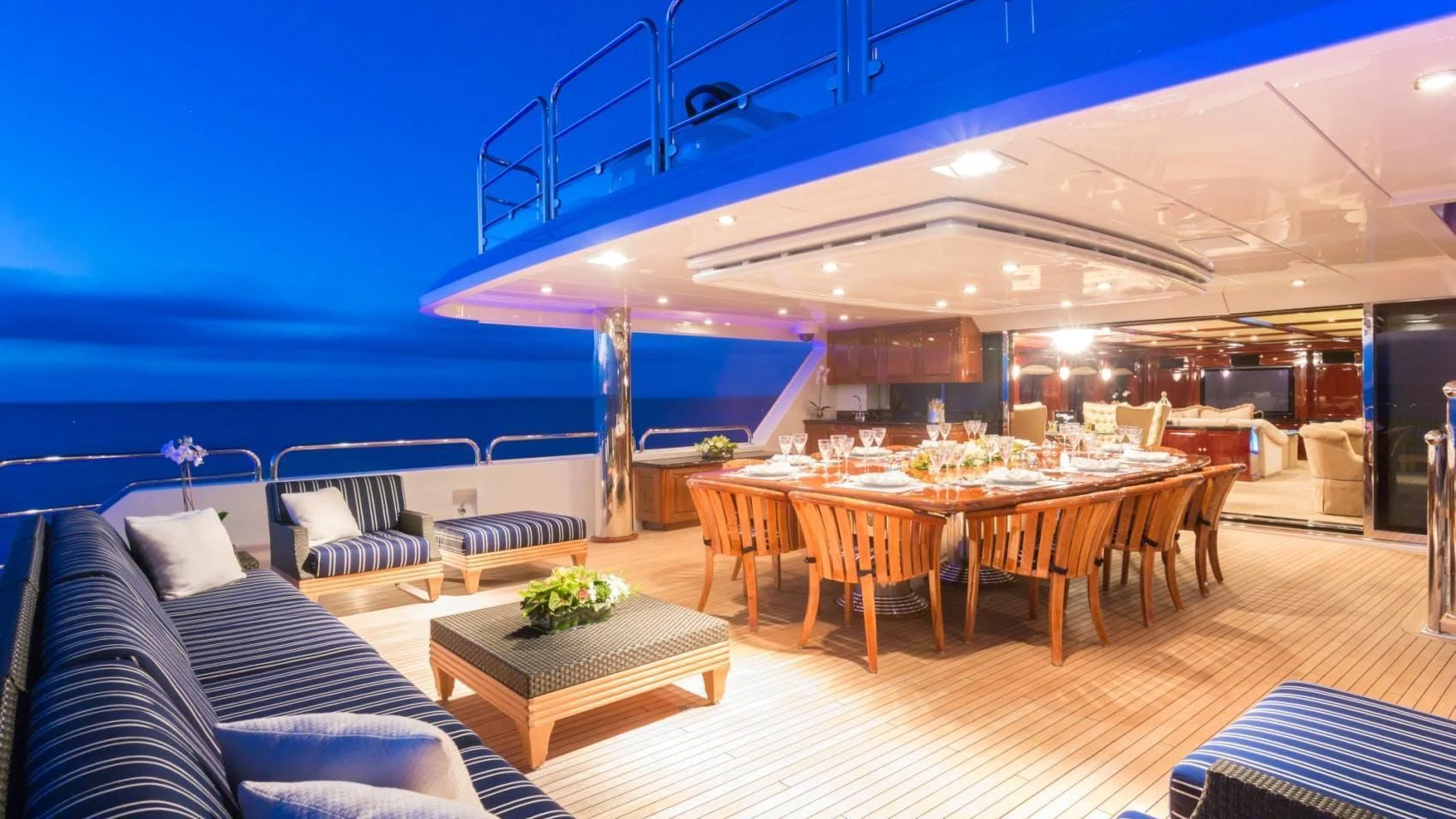 a large room with tables and chairs aboard LADY ELAINE Yacht for Charter