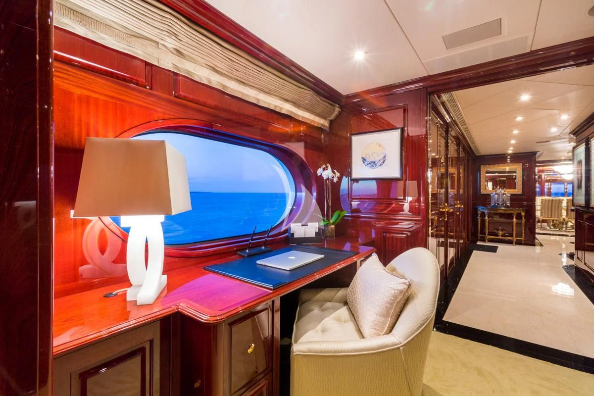 a room with a desk and a lamp aboard LADY ELAINE Yacht for Charter