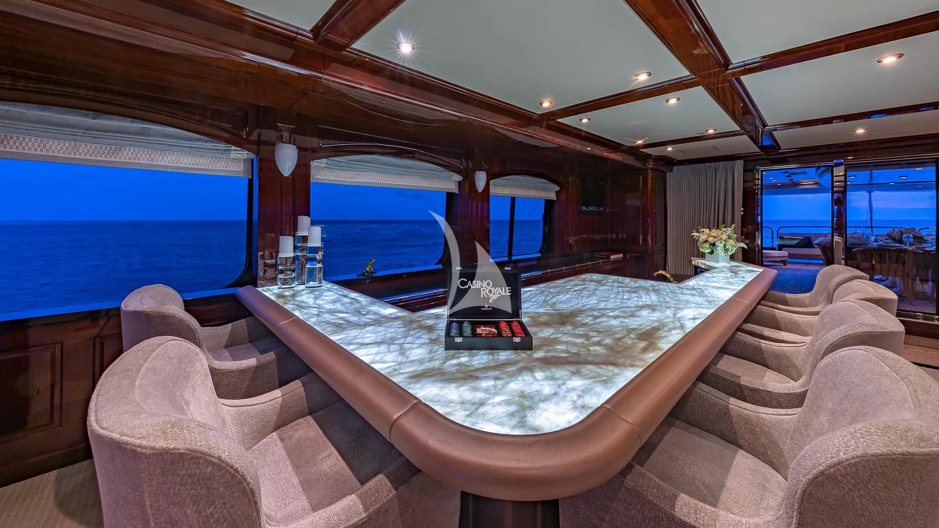 a large pool with a large jacuzzi aboard LADY ELAINE Yacht for Charter