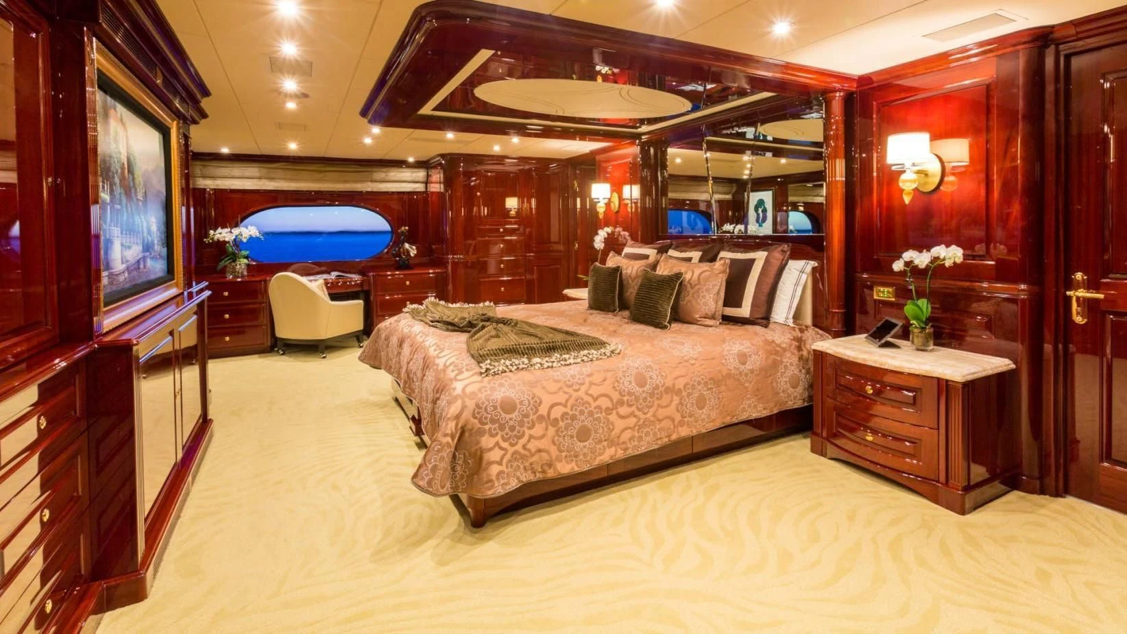 a large bedroom with a large bed aboard LADY ELAINE Yacht for Charter