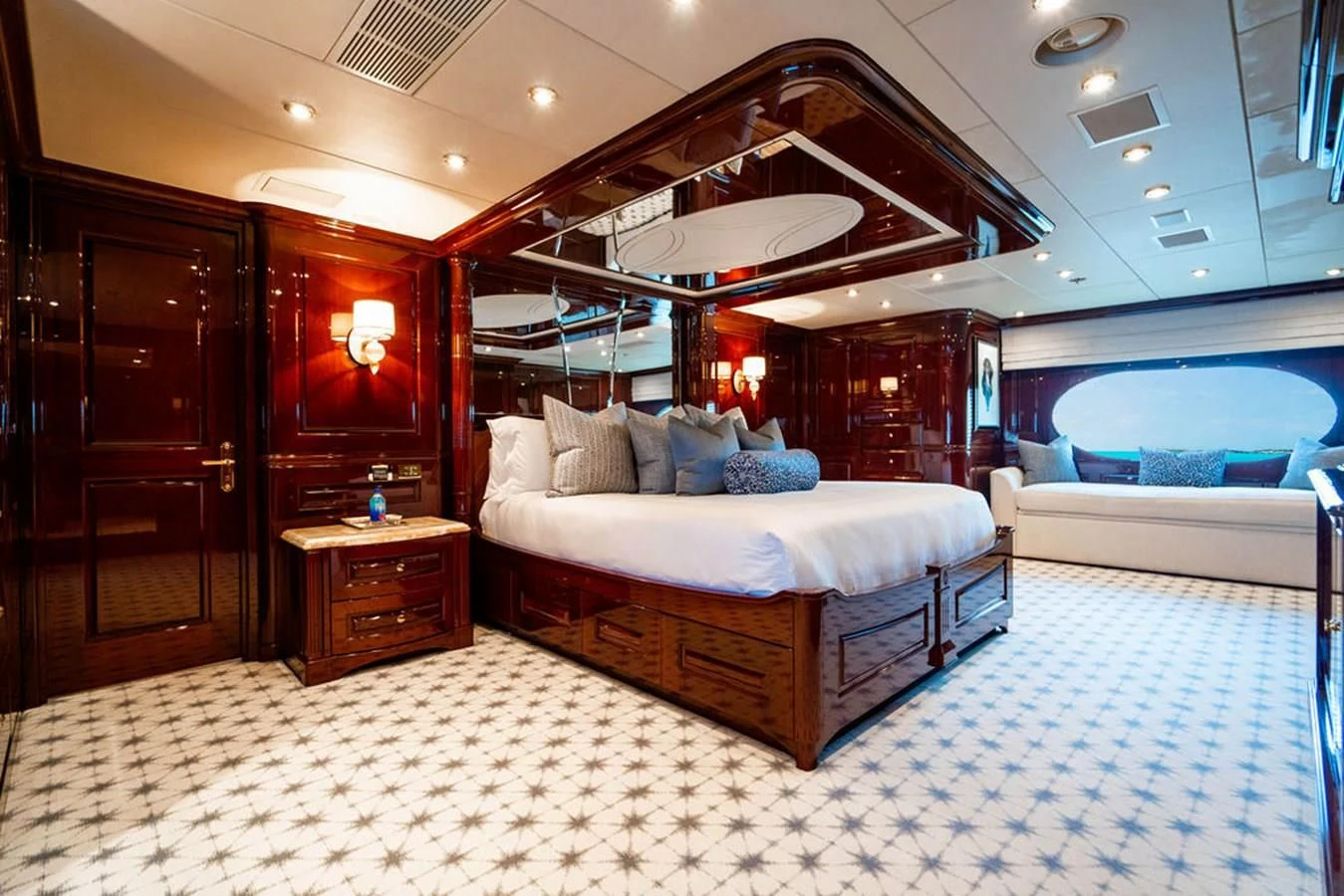 a large bedroom with a large bed aboard LADY ELAINE Yacht for Charter