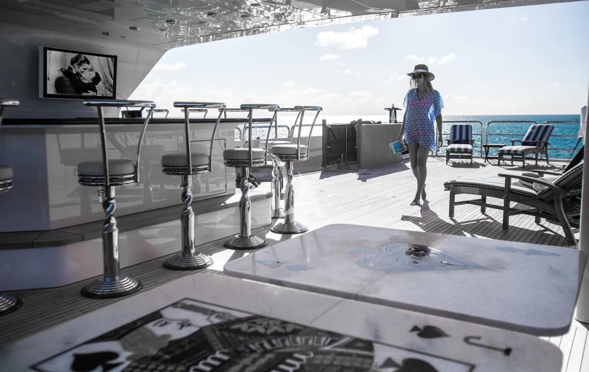 a person standing on a table aboard LADY ELAINE Yacht for Charter