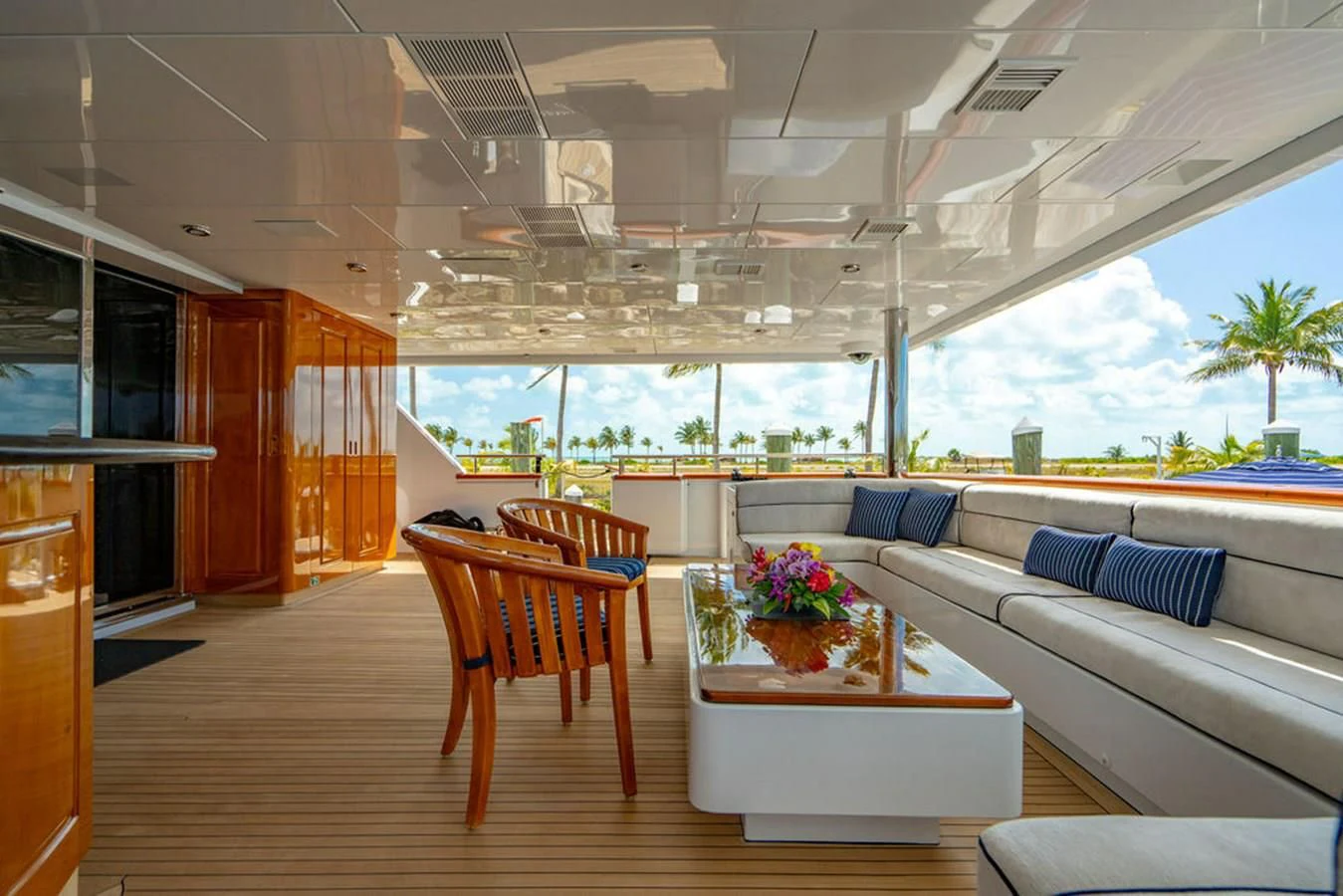 a living room with a large patio aboard LADY ELAINE Yacht for Charter