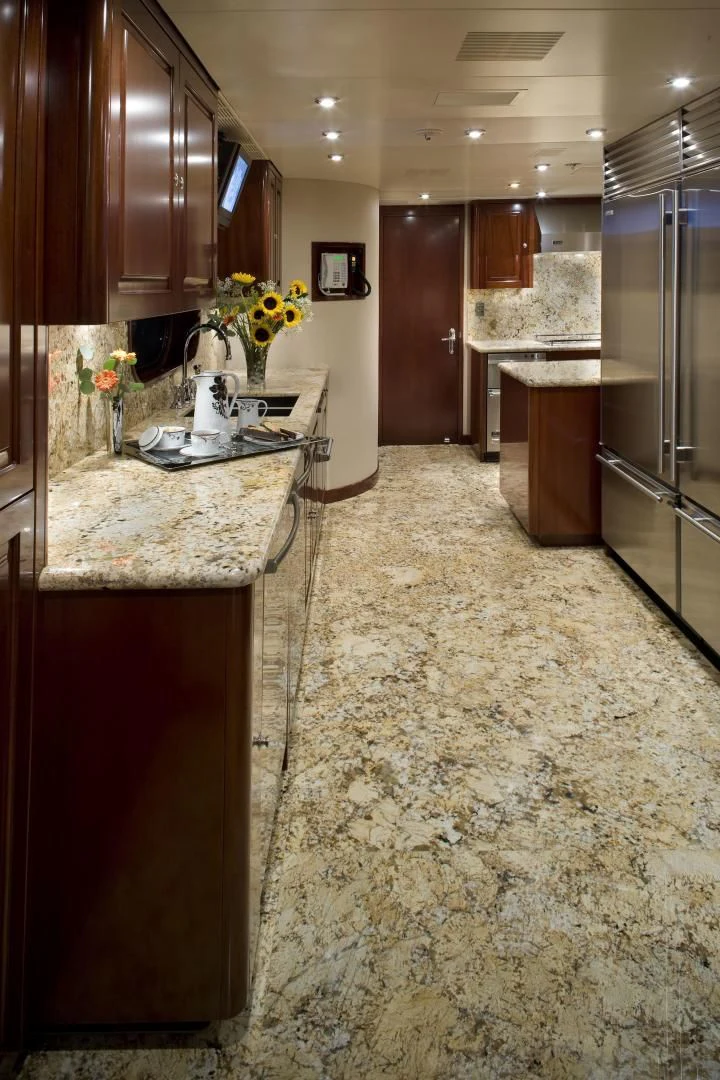 a kitchen with a marble counter top aboard LADY ELAINE Yacht for Charter